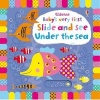 Baby's Very First Slide and See Under the Sea (Board book) - Fiona Watt Photo