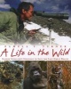 A Life in the Wild - George Schaller's Struggle to Save the Last Great Beasts (Hardcover, Fireside Hardco) - Pamela S Turner Photo