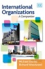 International Organizations - A Companion (Paperback) - Michael Davies Photo