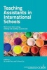 Teaching Assistants in International Schools - More than cutting, sticking and washing up paint pots! (Paperback, New) - Estelle Tarry Photo