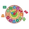 Shape Sorting Clock: Shape Sorting Clock (Novelty book) - Melissa Doug Photo