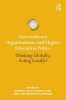 International Organizations and Higher Education Policy - Thinking Globally, Acting Locally? (Paperback) - Roberta Malee Bassett Photo