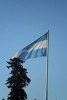 The Flag of Argentina Blowing in the Wind - Blank 150 Page Lined Journal for Your Thoughts, Ideas, and Inspiration (Paperback) - Unique Journal Photo