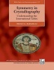 Symmetry in Crystallography - Understanding the International Tables (Paperback) - Paolo Radaelli Photo